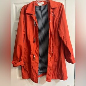 Super cute bold orange raincoat! Size medium.
